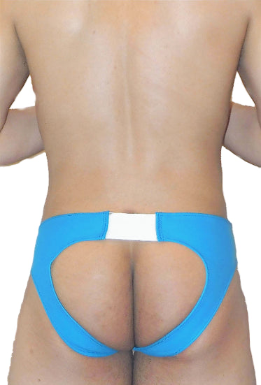 Person wearing blue underwear on a plain background