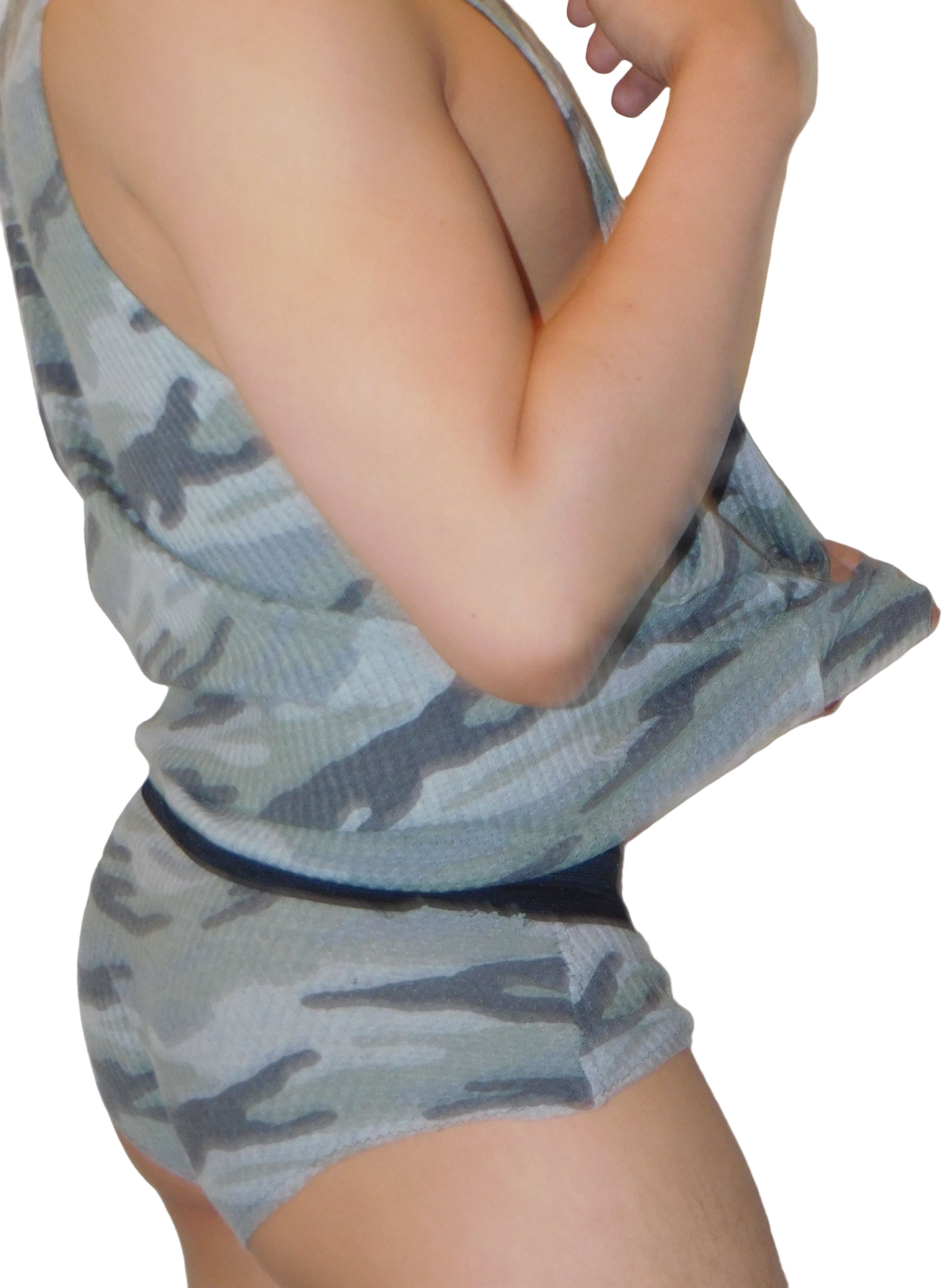 Person wearing a camouflage-patterned outfit with a white background